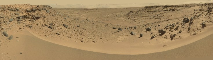 The view from "dingo gap" by the Curiosity rover in Gale crater on Mars.  This image was stitched together by Emily Lakdawalla from images available from NASA/JPL/Caltech on sol 528 (Jan 28, 2014).  You need to click on this image to see the full size! Visit Lakdawalla's blog.
